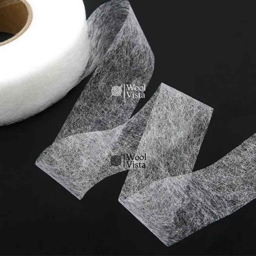 DOUBLE SIDED ADHESIVE HEM TAPE – NON-WOVEN IRON-ON FABRIC TAPE FOR CLOTHES, CURTAINS & CRAFTS