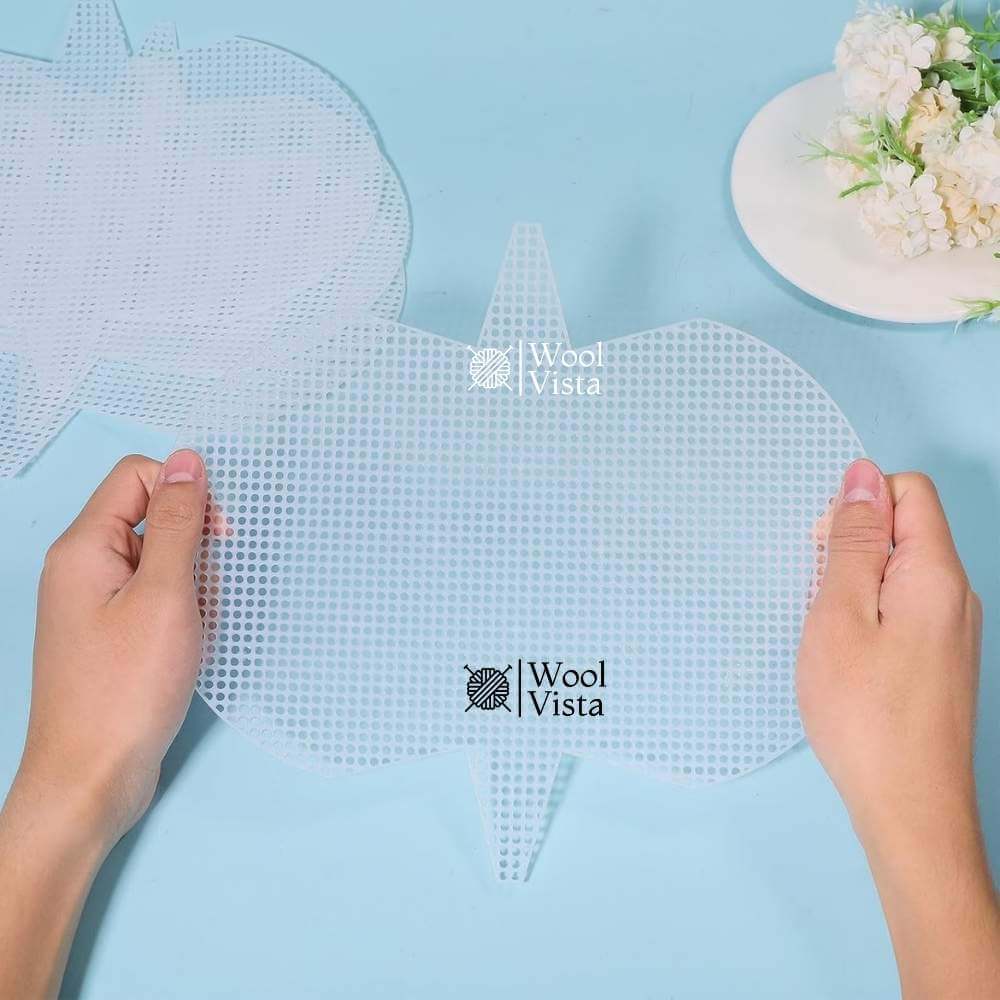 Hands holding a white crossbody bag plastic mesh canvas sheet with grid holes