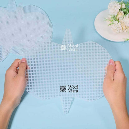 Hands holding a white crossbody bag plastic mesh canvas sheet with grid holes
